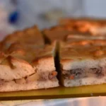 Bosnian Cuisine Featuring Ćevapi, Burek, and Tufahije