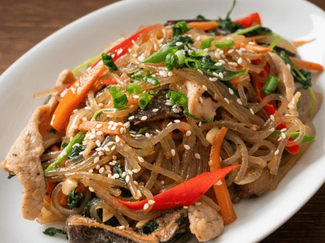 Japchae Noodles Recipe: Easy Korean Stir-Fried Glass Noodles.