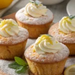 Lemon Cream Cheese Muffins on a Plate with Lemon Slices