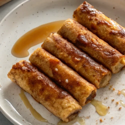 Sausage French Toast Roll-Ups with maple drizzle